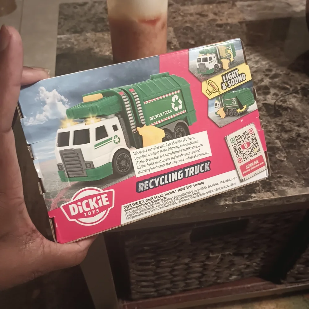 Green and White Recycling Truck
